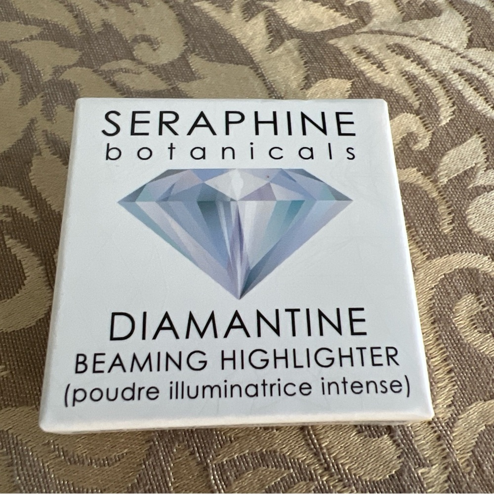 Seraphine Botanicals Diamantine Beaming Highlighter in OYSTER 2g/.07oz.